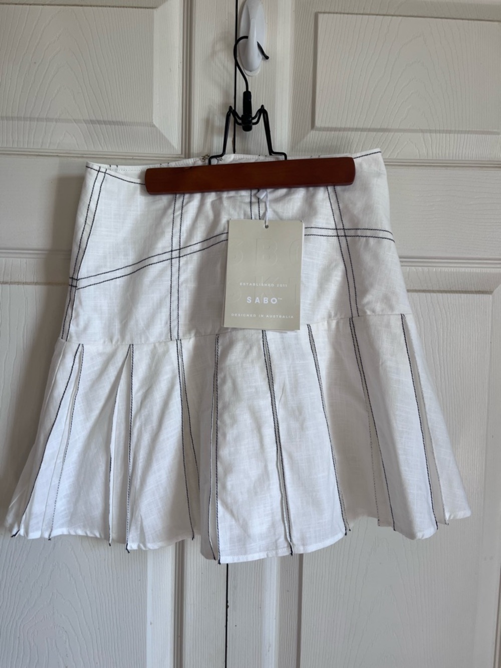 SABO White Pleated Mini Skirt with Contrast Black Stitching